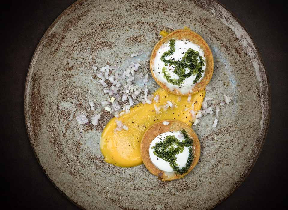 Pumpkin blinis with fresh cheese moai caviar