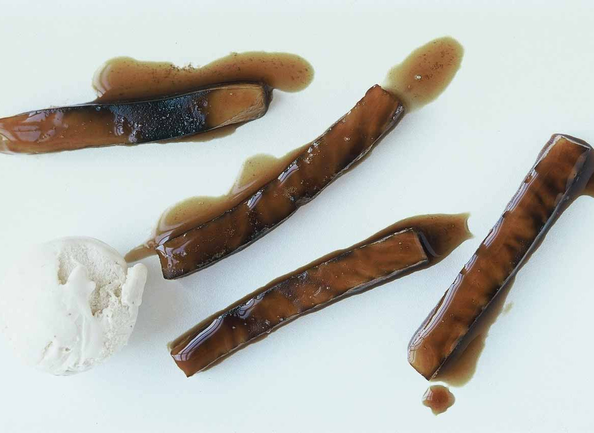 Soft candied celeriac batons with brown sugar, vanilla ice cream, and fresh chestnut