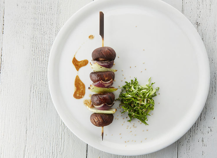 Skewer of Chestnut Mushrooms, Red Onion, and Pak Choi with Soy-Yuzu Dressing