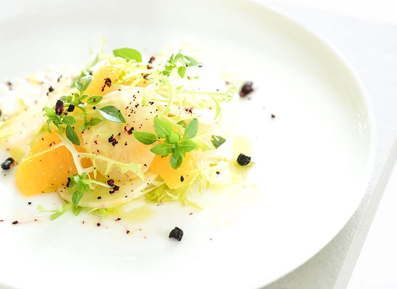 Crispy Yacon with Orange, Basil Pistou, Za’atar, Curly Lettuce & Blueberries