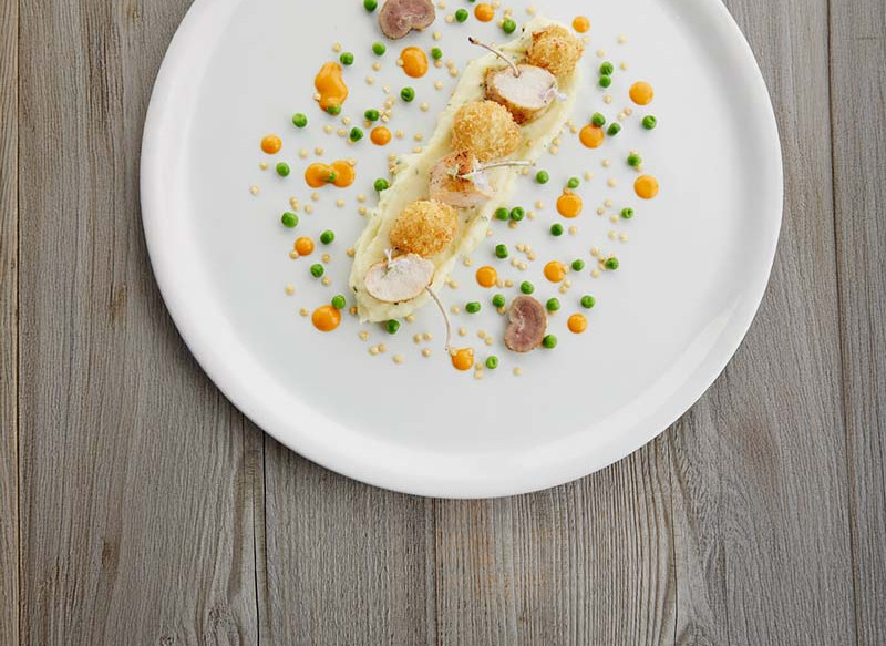 Cauliflower croquettes with paprika drops, pan-fried rabbit cutlet with peas, lemon & rosemary. 