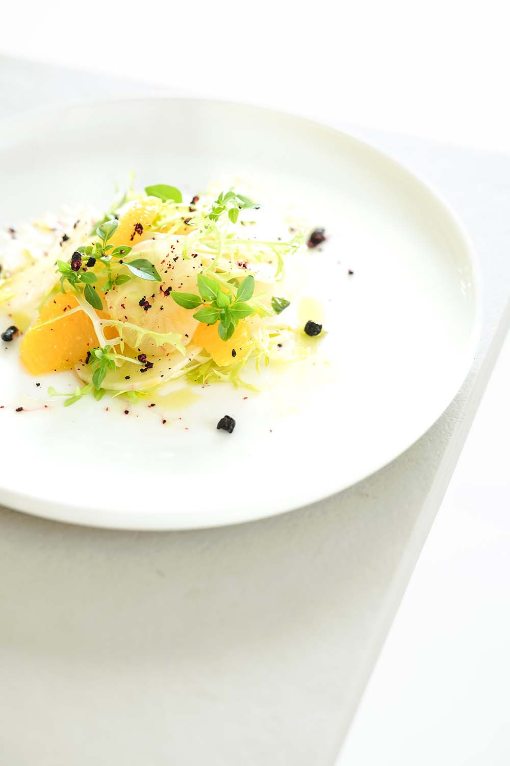 Crispy Yacon with Orange, Basil Pistou, Za’atar, Curly Lettuce & Blueberries